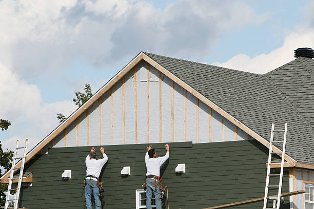 Professional Siding Replacement technician working in Saluda, VA